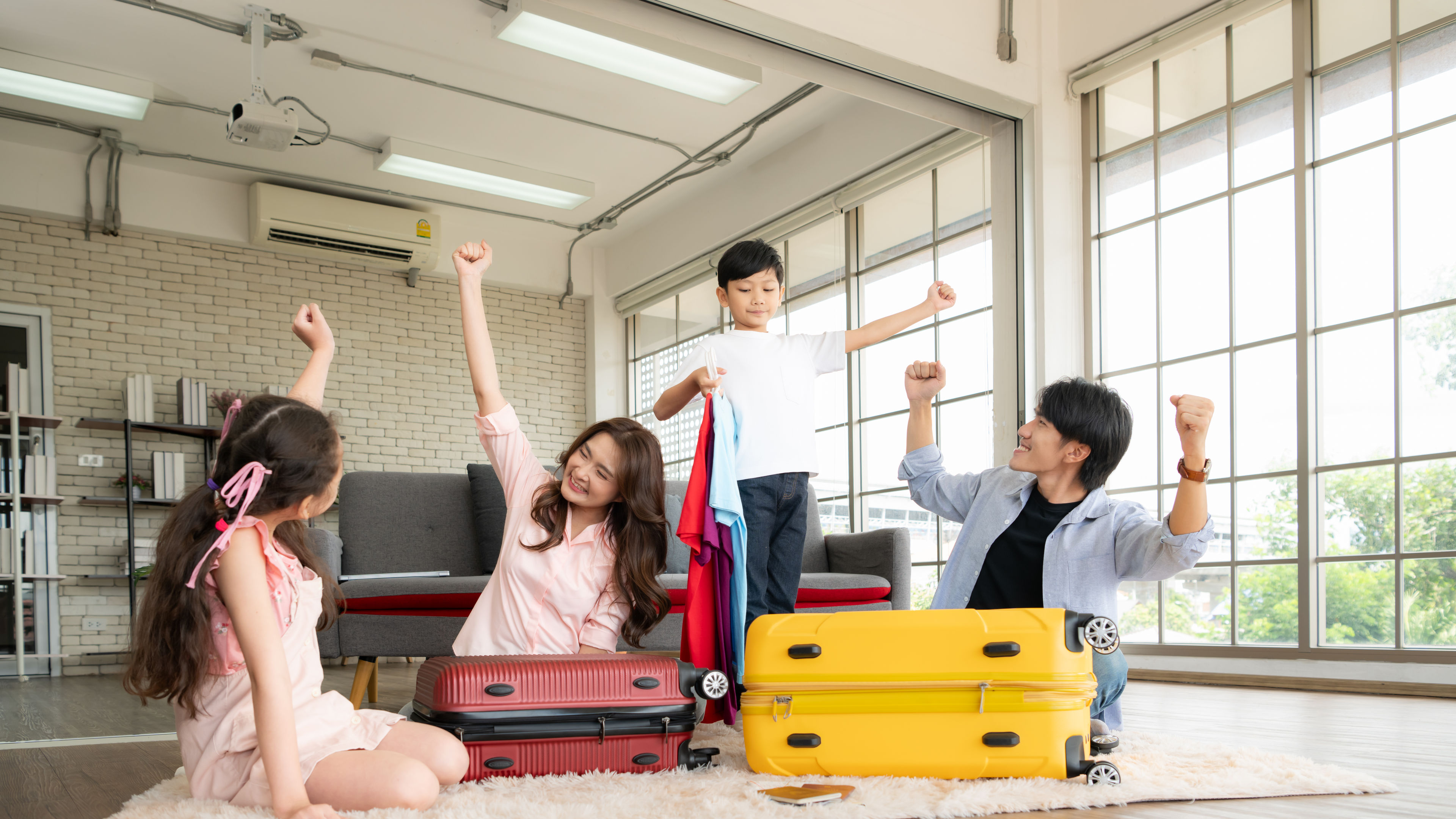 A family packing bags for a trip