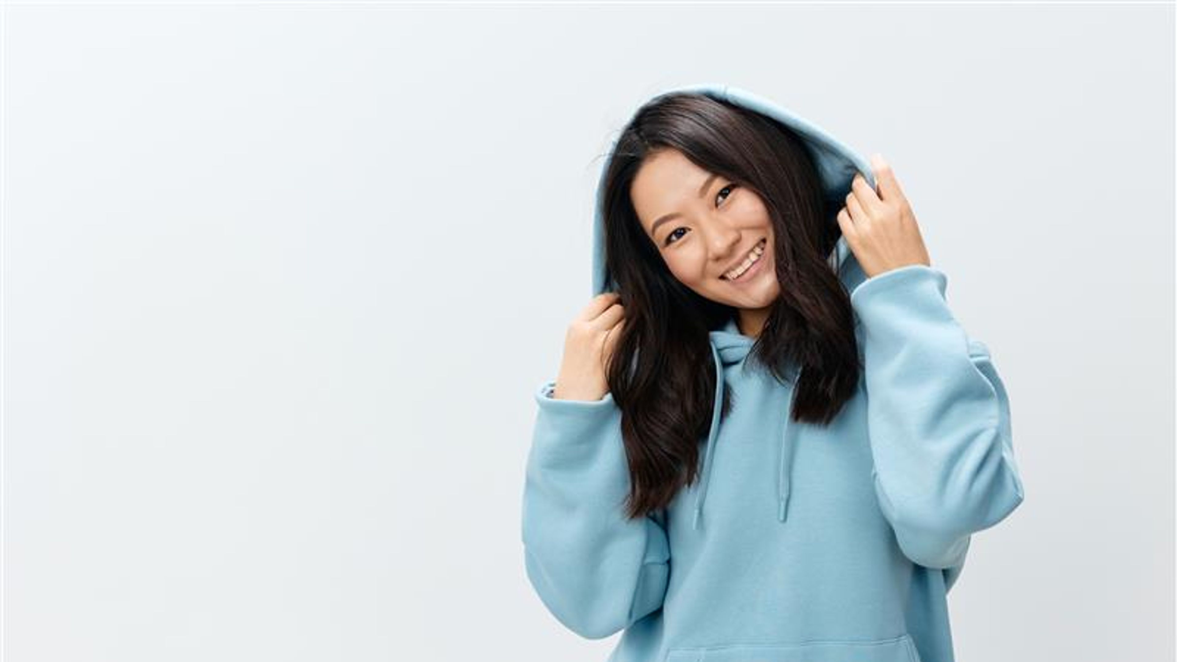 A girl in a blue hoodie