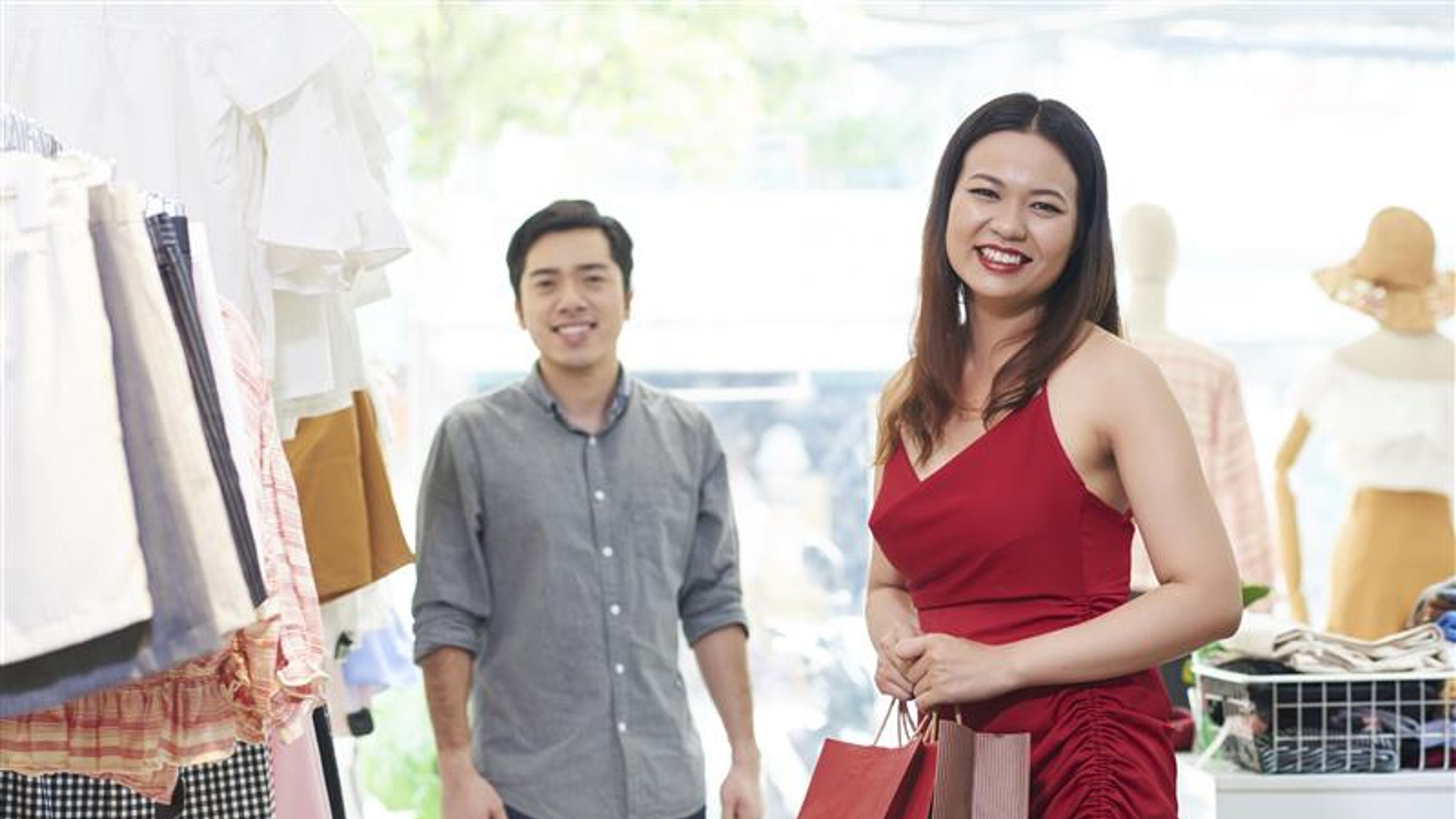 A woman shopping with her boyfriend