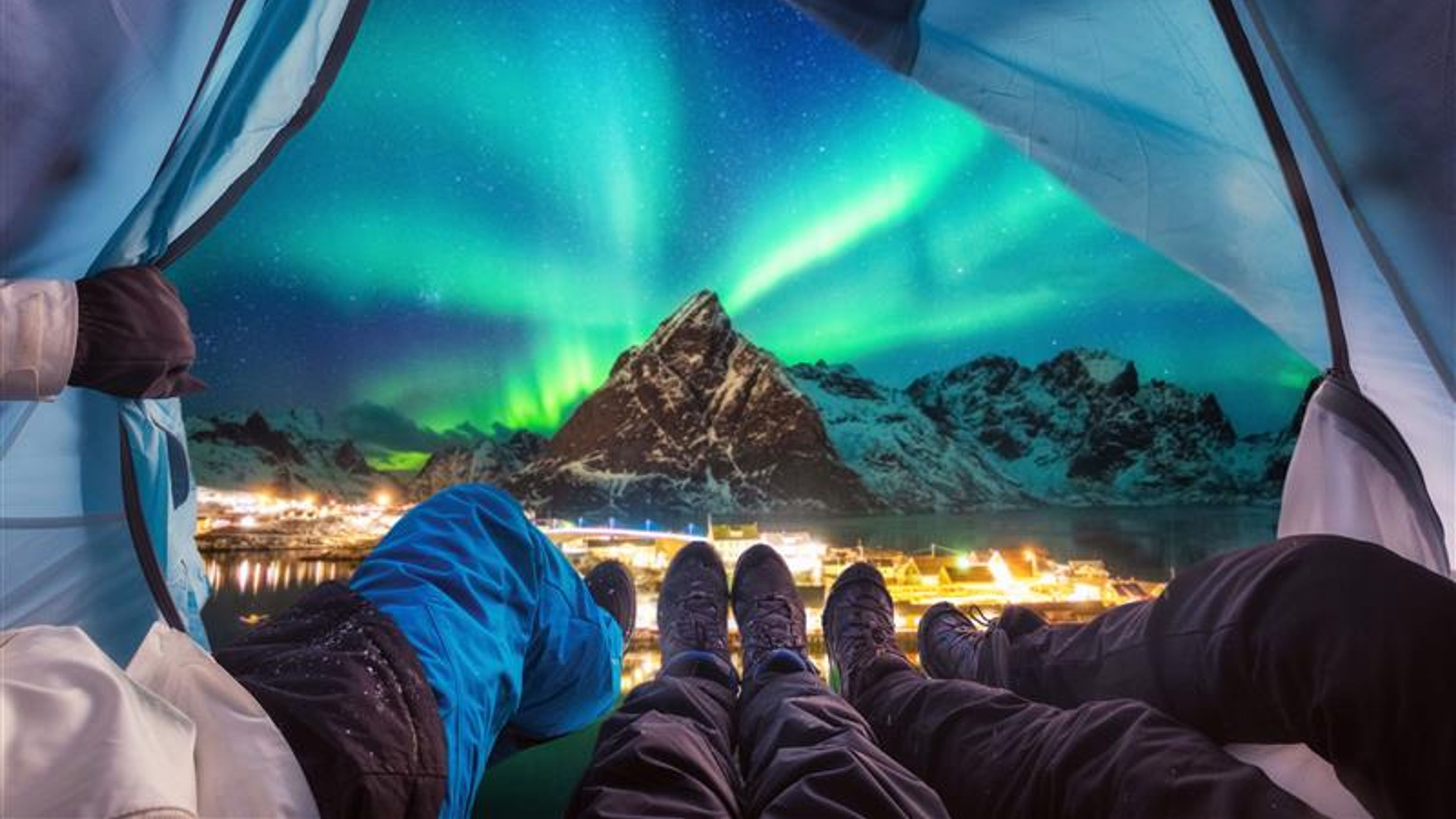 Some people watching northern lights.