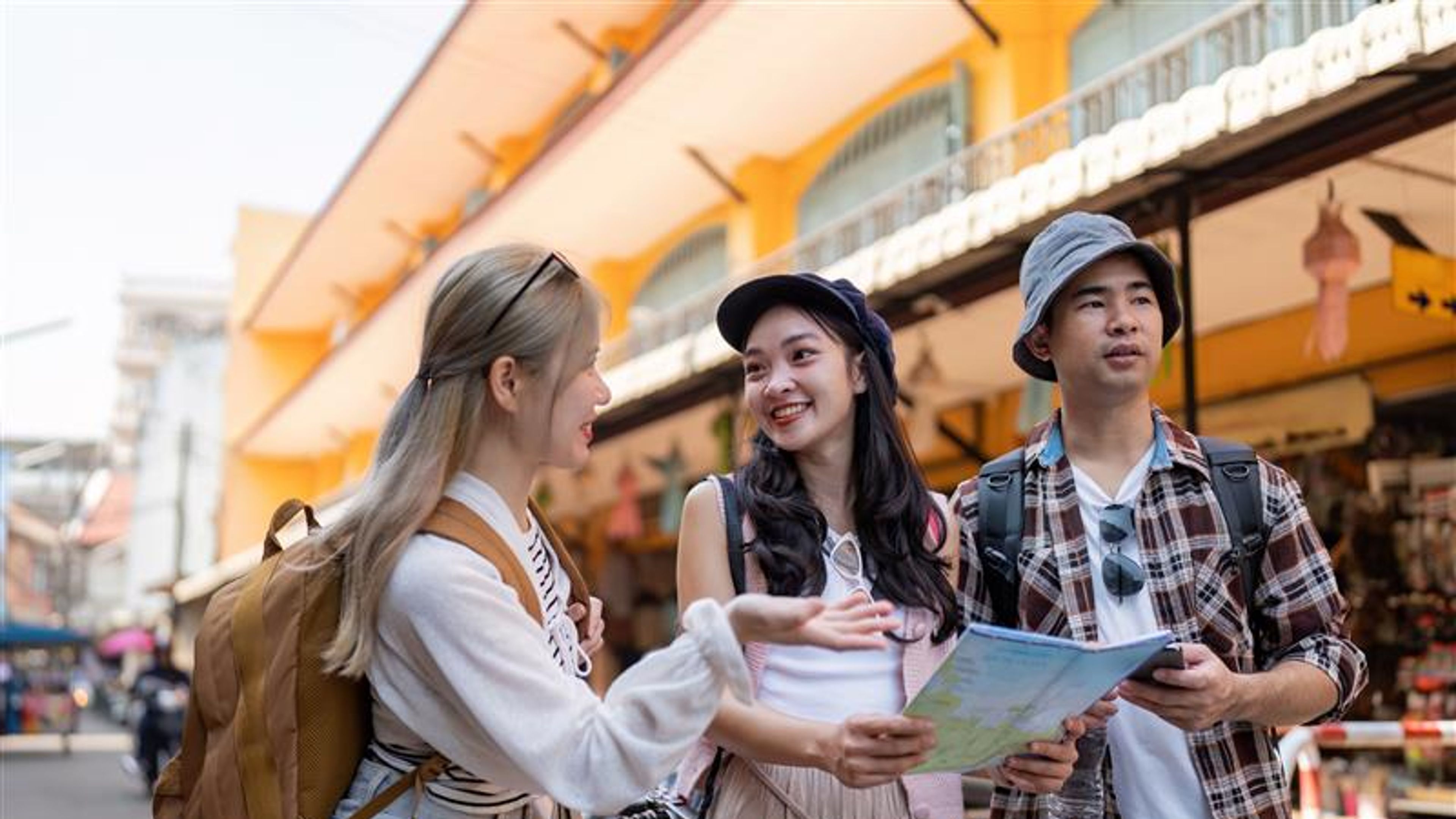 Three friends navigate a local market creating lasting memories