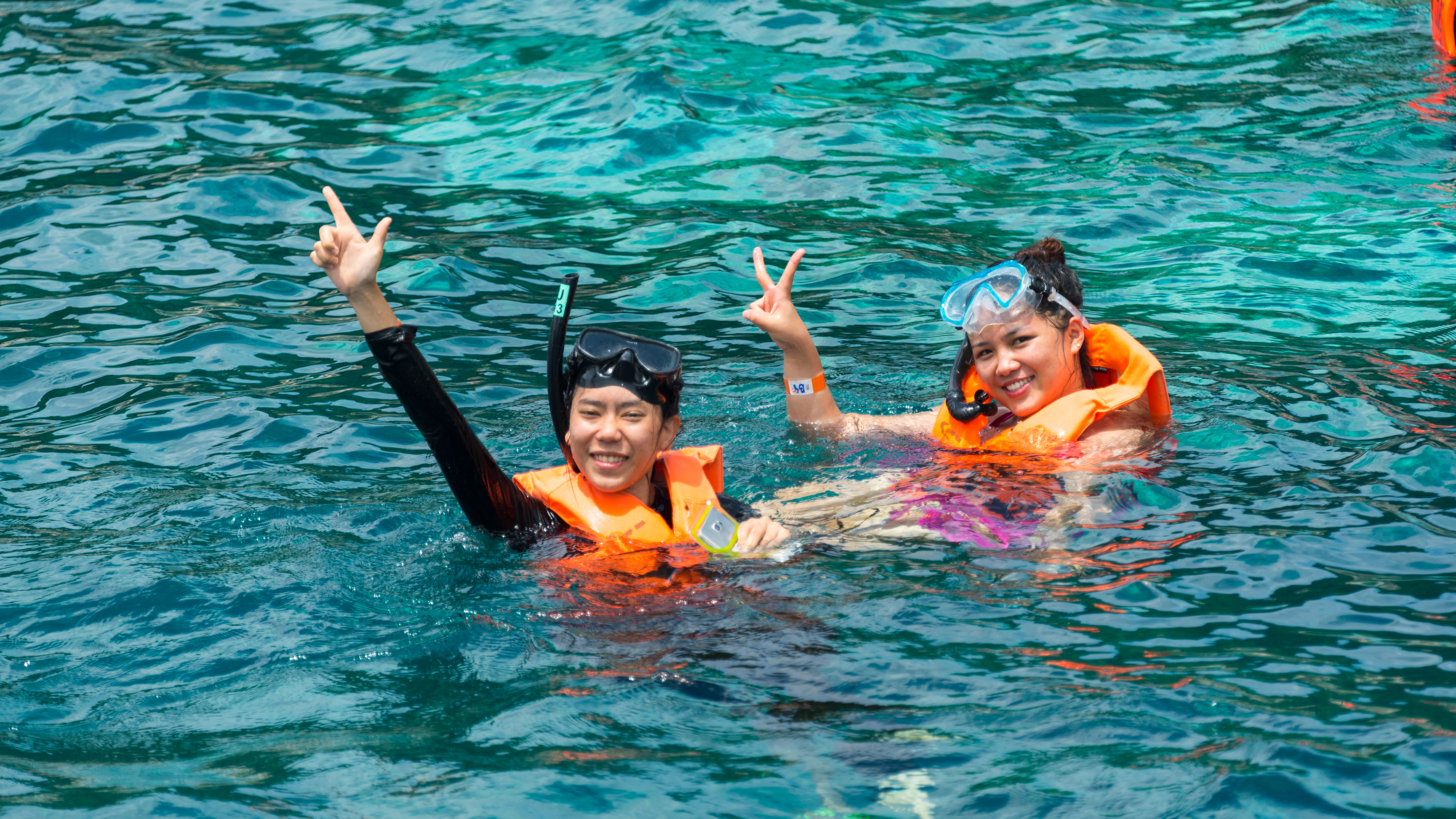 Two women in life jackets